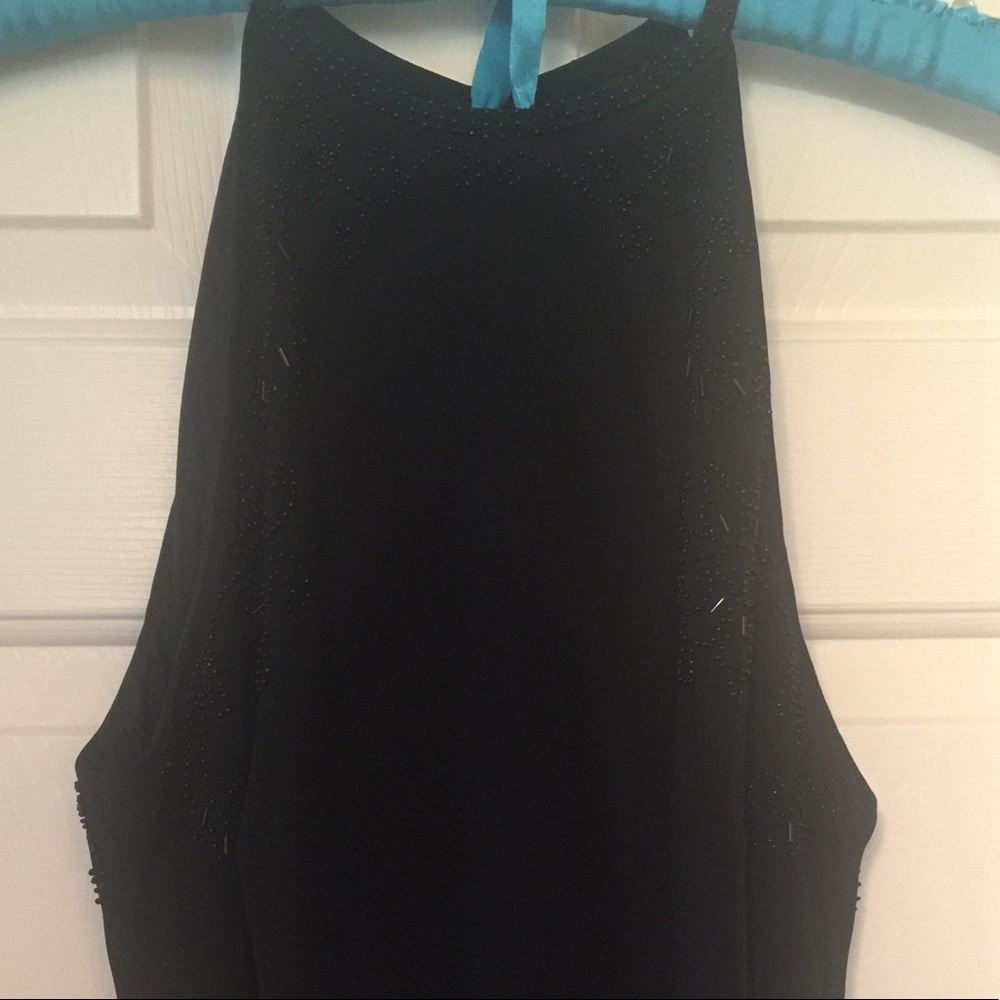 Classic dress with neckline embellishments